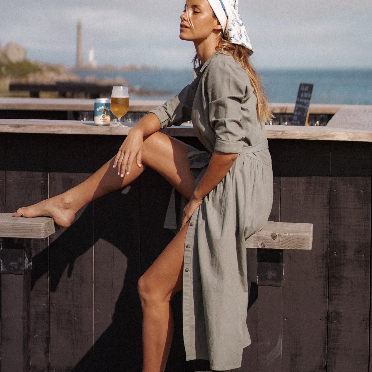 Crafted in khaki cotton twill, this shirt dress features a trapeze silhouette and a slightly gathered waist.